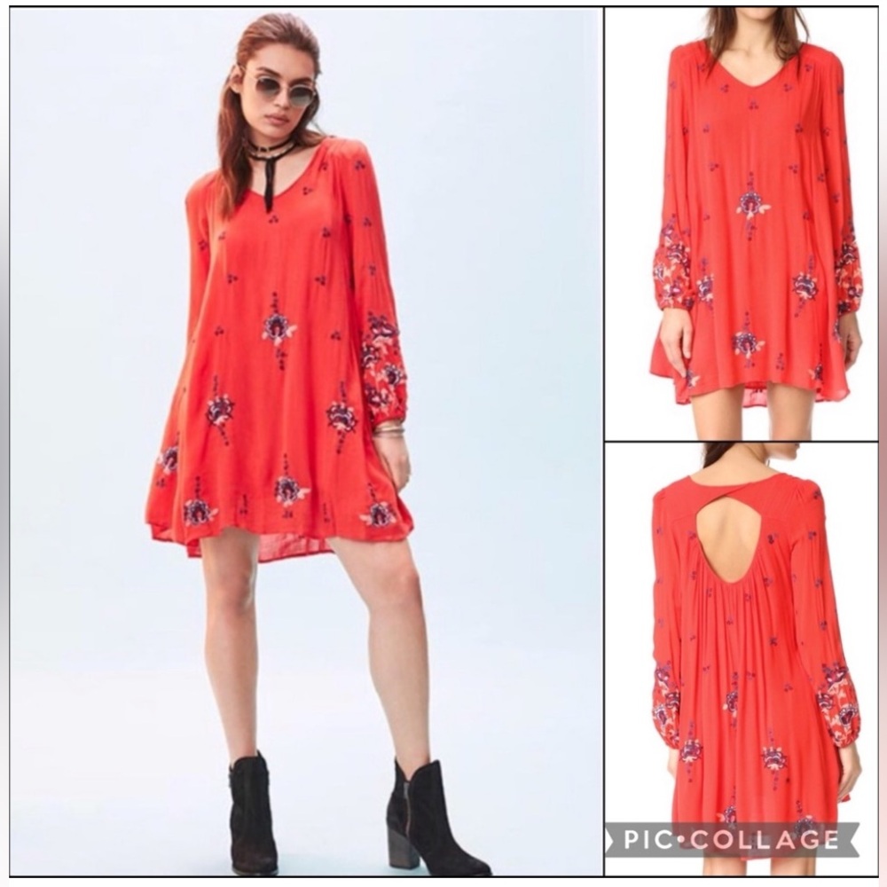 Free People Red Embroidered
Gauze Balloon Sleeve Mini Swing
Dress Size: M